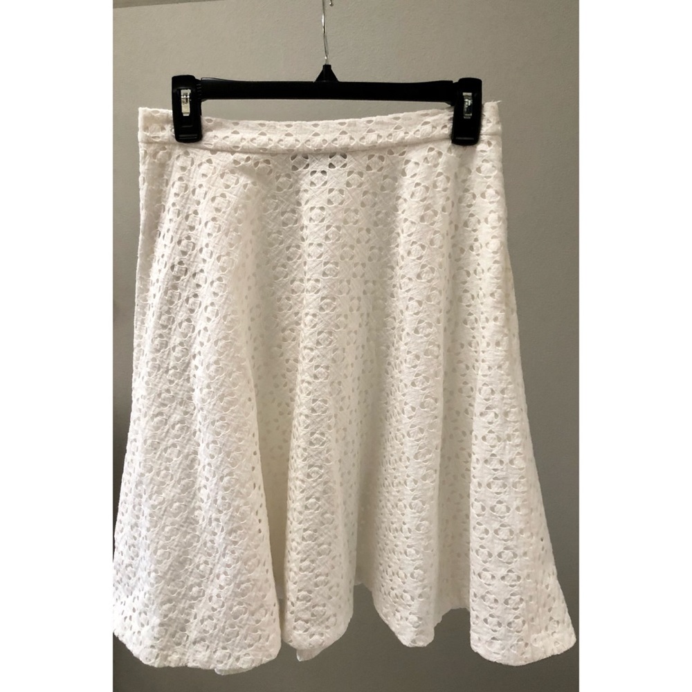 White circle skirt with lace-like details